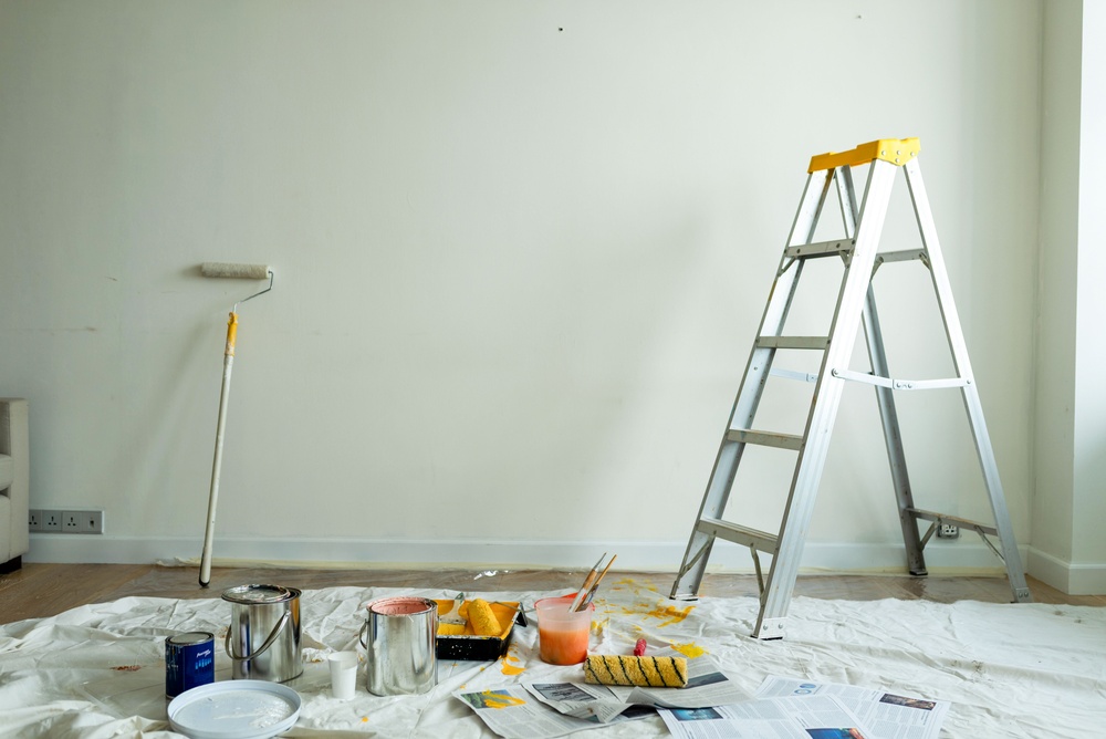 A room prepped for painting by Nephew's Painting